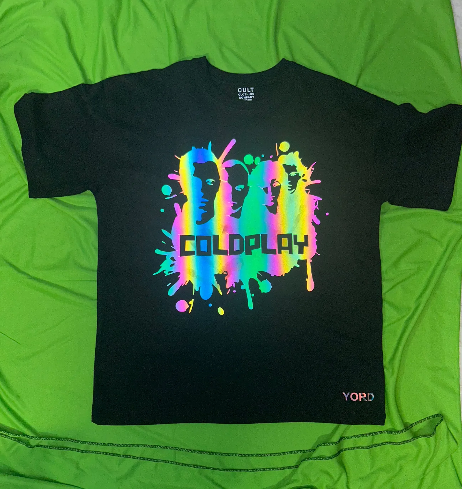 ['Coldplay Faces Splash Premium French Terry Rainbow Reflector T-Shirt by YORD (T-Shirts) - photo 1 of 3', 'Coldplay Faces Splash Premium French Terry Rainbow Reflector T-Shirt by YORD (T-Shirts) - photo 2 of 3', 'Coldplay Faces Splash Premium French Terry Rainbow Reflector T-Shirt by YORD (T-Shirts) - photo 3 of 3']