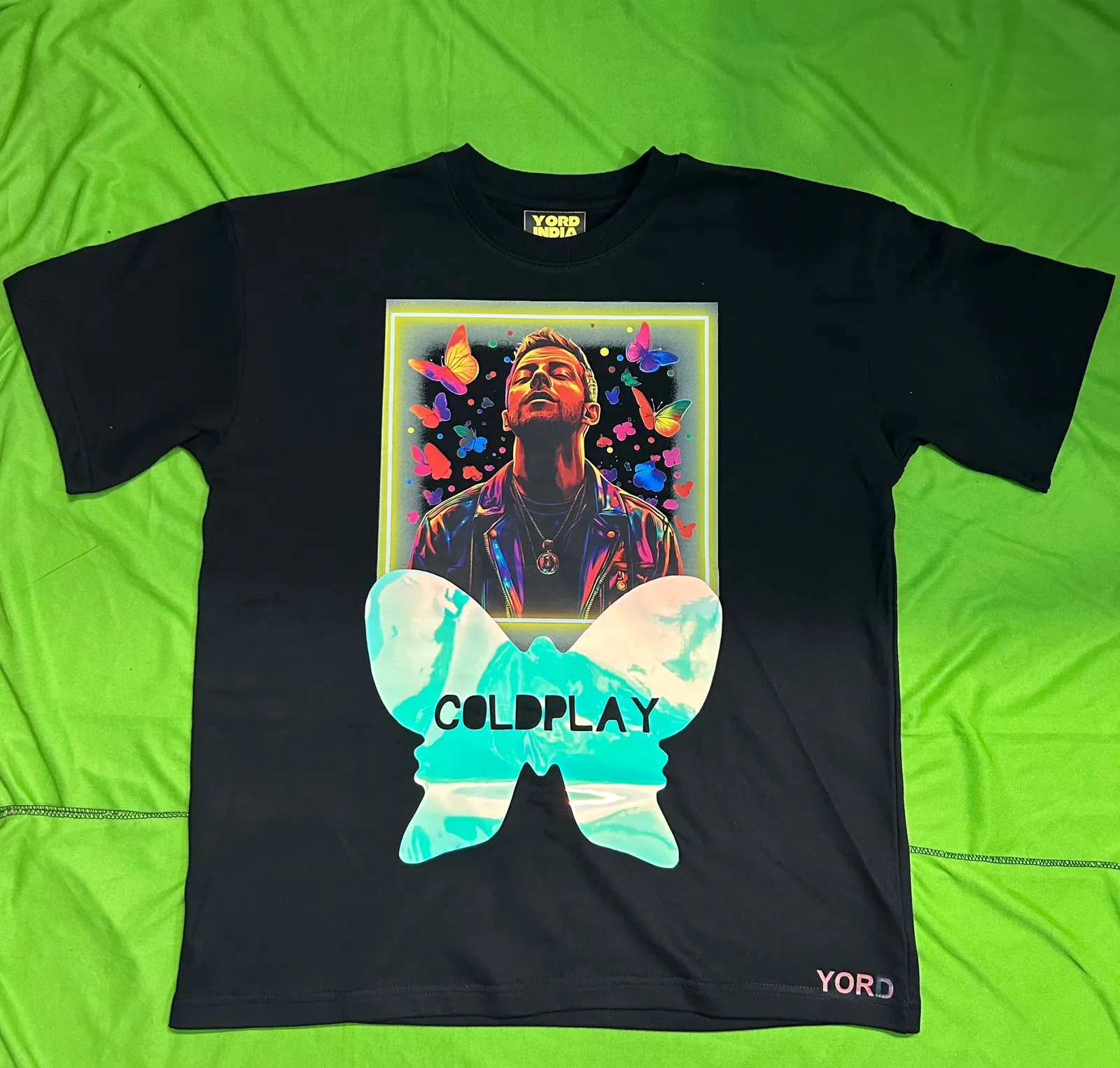 ['Coldplay "Chris Martin and butterfly"  Premium French Terry Cotton Glow in dark T-Shirt by YORD (T-Shirts) - photo 1 of 3', 'Coldplay "Chris Martin and butterfly"  Premium French Terry Cotton Glow in dark T-Shirt by YORD (T-Shirts) - photo 2 of 3', 'Coldplay "Chris Martin and butterfly"  Premium French Terry Cotton Glow in dark T-Shirt by YORD (T-Shirts) - photo 3 of 3']