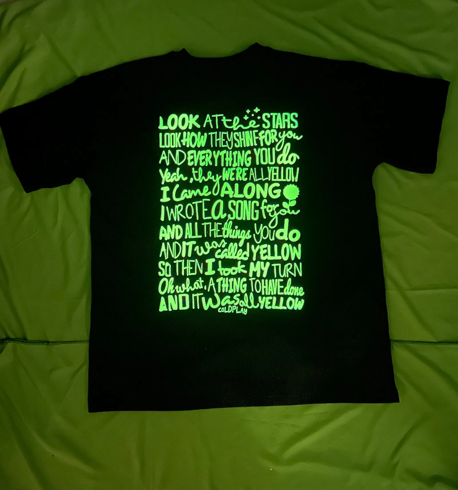['Coldplay Glow In Dark Oversized T-Shirt Back Lyrics by YORD (T-Shirts) - photo 1 of 3', 'Coldplay Glow In Dark Oversized T-Shirt Back Lyrics by YORD (T-Shirts) - photo 2 of 3', 'Coldplay Glow In Dark Oversized T-Shirt Back Lyrics by YORD (T-Shirts) - photo 3 of 3']