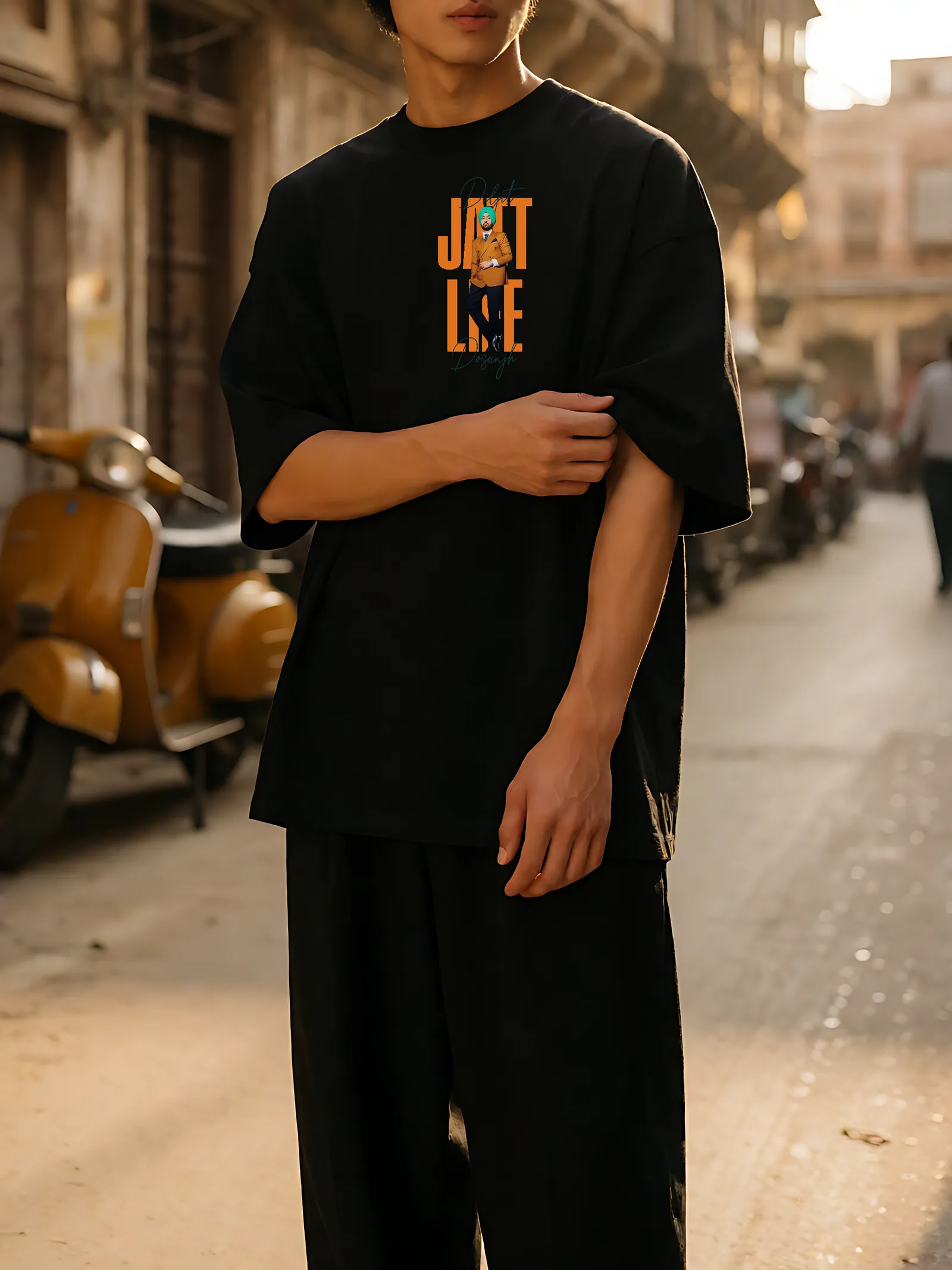 Jatt Life Orange Type Oversized T-Shirt worn, front print in the street