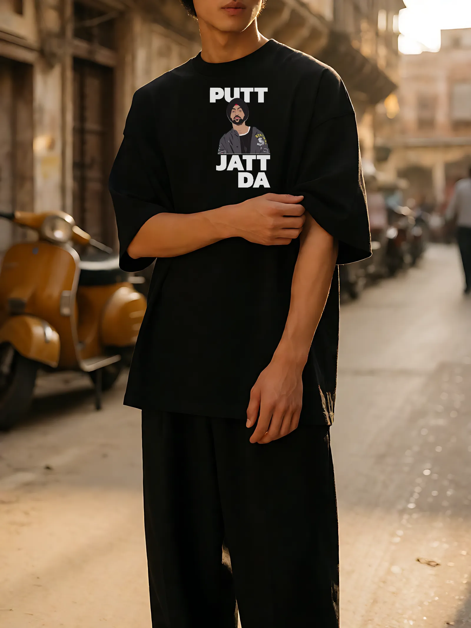Putt Jatt Da Oversized T-Shirt worn, front print in the street