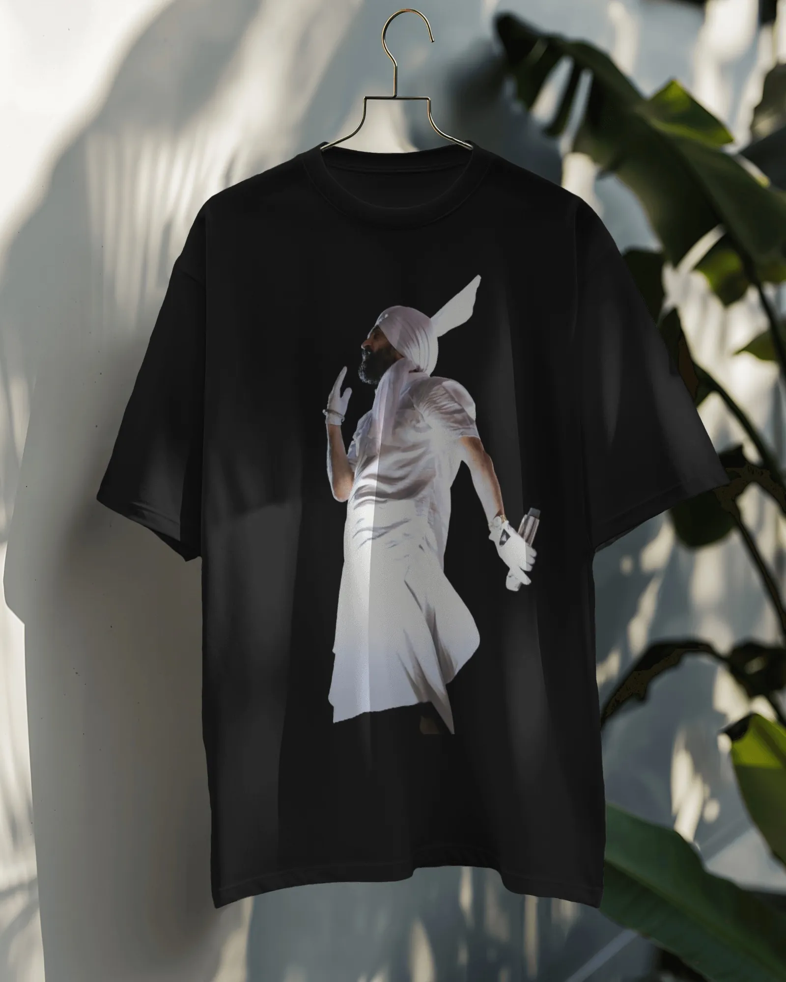 Dil-Luminati Wings Figure Oversized T-Shirt — worn shot 2