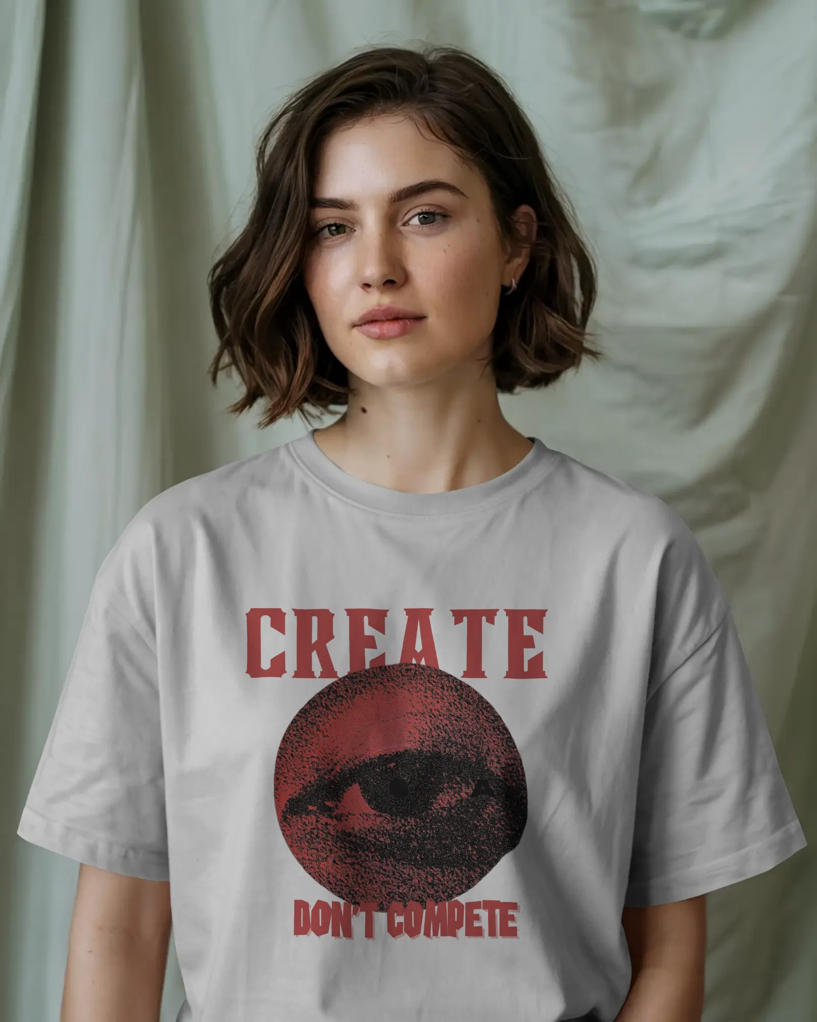 ["Premium 'CREATE DON'T COMPETE' Oversized Eye Graphic Tee by YORD (T-Shirts) - photo 1 of 12", "Premium 'CREATE DON'T COMPETE' Oversized Eye Graphic Tee by YORD (T-Shirts) - photo 2 of 12", "Premium 'CREATE DON'T COMPETE' Oversized Eye Graphic Tee by YORD (T-Shirts) - photo 3 of 12", "Premium 'CREATE DON'T COMPETE' Oversized Eye Graphic Tee by YORD (T-Shirts) - photo 4 of 12", "Premium 'CREATE DON'T COMPETE' Oversized Eye Graphic Tee by YORD (T-Shirts) - photo 5 of 12", "Premium 'CREATE DON'T COMPETE' Over
