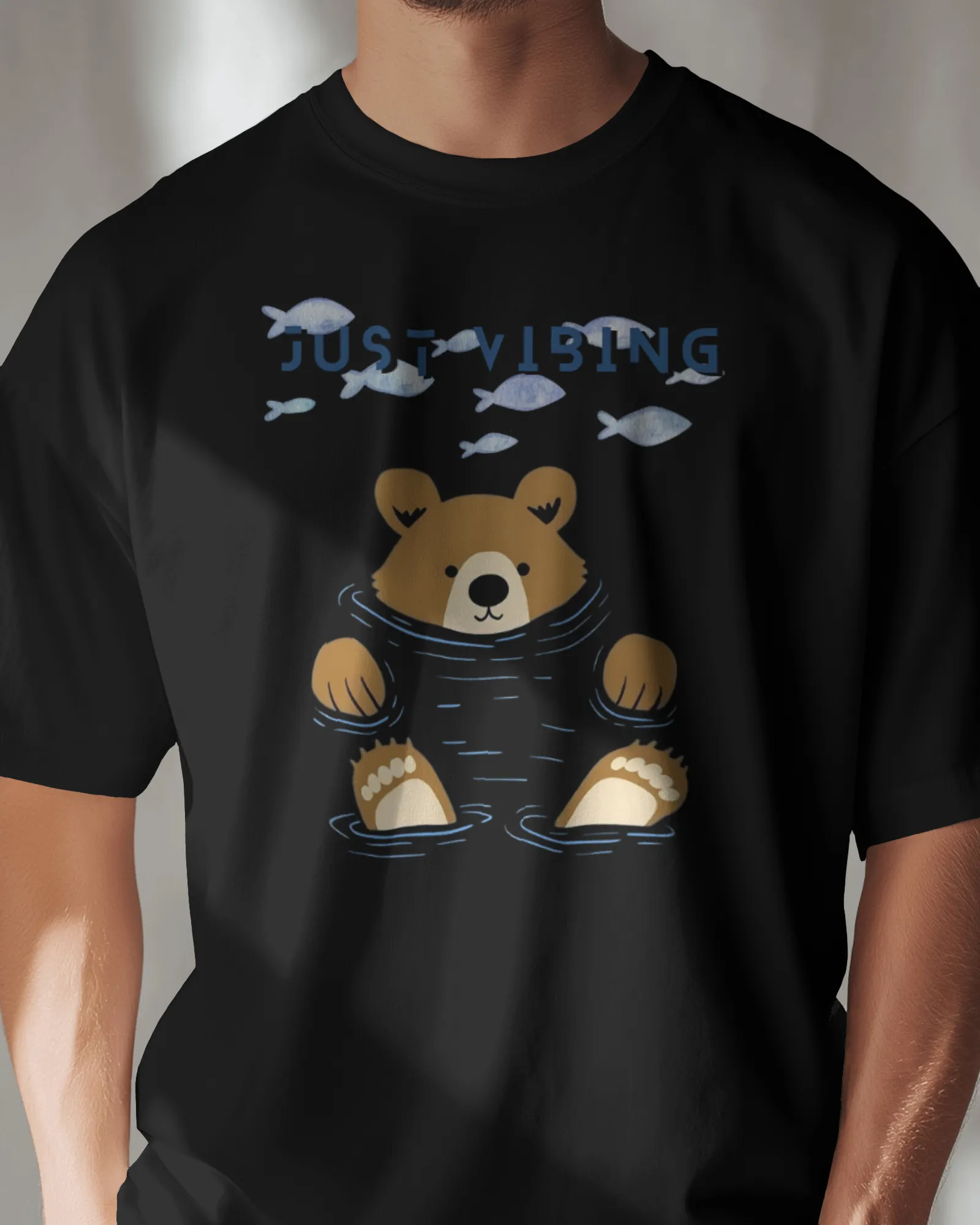["Premium 'Just Vibing' Bear & Fish Print Regular T-shirt by YORD (T-Shirts) - photo 1 of 7", "Premium 'Just Vibing' Bear & Fish Print Regular T-shirt by YORD (T-Shirts) - photo 2 of 7", "Premium 'Just Vibing' Bear & Fish Print Regular T-shirt by YORD (T-Shirts) - photo 3 of 7", "Premium 'Just Vibing' Bear & Fish Print Regular T-shirt by YORD (T-Shirts) - photo 4 of 7", "Premium 'Just Vibing' Bear & Fish Print Regular T-shirt by YORD (T-Shirts) - photo 5 of 7", "Premium 'Just Vibing' Bear & Fish Print Regul