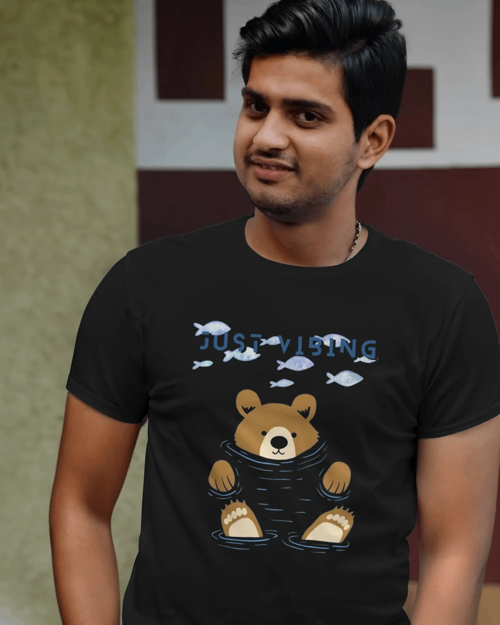 ["Premium 'Just Vibing' Bear & Fish Print Regular T-shirt by YORD (T-Shirts) - photo 1 of 7", "Premium 'Just Vibing' Bear & Fish Print Regular T-shirt by YORD (T-Shirts) - photo 2 of 7", "Premium 'Just Vibing' Bear & Fish Print Regular T-shirt by YORD (T-Shirts) - photo 3 of 7", "Premium 'Just Vibing' Bear & Fish Print Regular T-shirt by YORD (T-Shirts) - photo 4 of 7", "Premium 'Just Vibing' Bear & Fish Print Regular T-shirt by YORD (T-Shirts) - photo 5 of 7", "Premium 'Just Vibing' Bear & Fish Print Regul