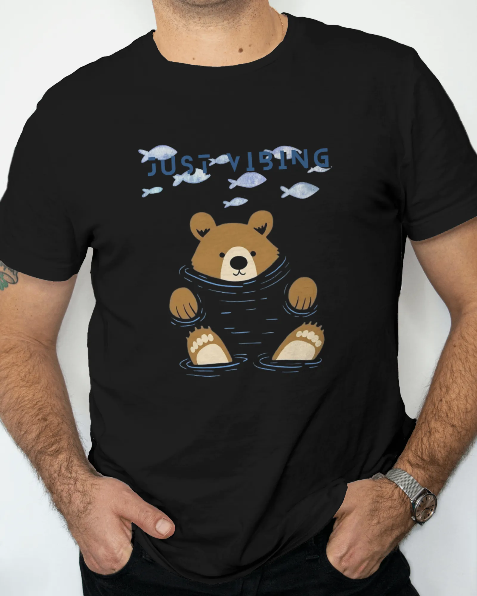 ["Premium 'Just Vibing' Bear & Fish Print Regular T-shirt by YORD (T-Shirts) - photo 1 of 7", "Premium 'Just Vibing' Bear & Fish Print Regular T-shirt by YORD (T-Shirts) - photo 2 of 7", "Premium 'Just Vibing' Bear & Fish Print Regular T-shirt by YORD (T-Shirts) - photo 3 of 7", "Premium 'Just Vibing' Bear & Fish Print Regular T-shirt by YORD (T-Shirts) - photo 4 of 7", "Premium 'Just Vibing' Bear & Fish Print Regular T-shirt by YORD (T-Shirts) - photo 5 of 7", "Premium 'Just Vibing' Bear & Fish Print Regul
