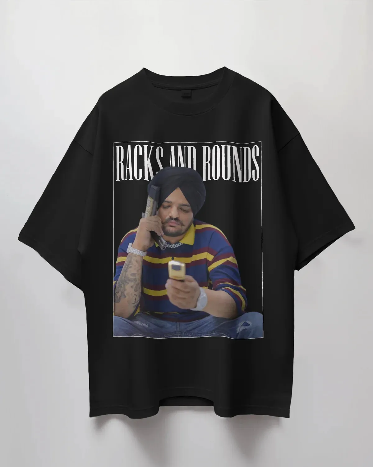 ["Premium Oversized 'Racks and Rounds' Tribute T-Shirt by YORD (T-Shirts) - photo 1 of 9", "Premium Oversized 'Racks and Rounds' Tribute T-Shirt by YORD (T-Shirts) - photo 2 of 9", "Premium Oversized 'Racks and Rounds' Tribute T-Shirt by YORD (T-Shirts) - photo 3 of 9", "Premium Oversized 'Racks and Rounds' Tribute T-Shirt by YORD (T-Shirts) - photo 4 of 9", "Premium Oversized 'Racks and Rounds' Tribute T-Shirt by YORD (T-Shirts) - photo 5 of 9", "Premium Oversized 'Racks and Rounds' Tribute T-Shirt by YORD