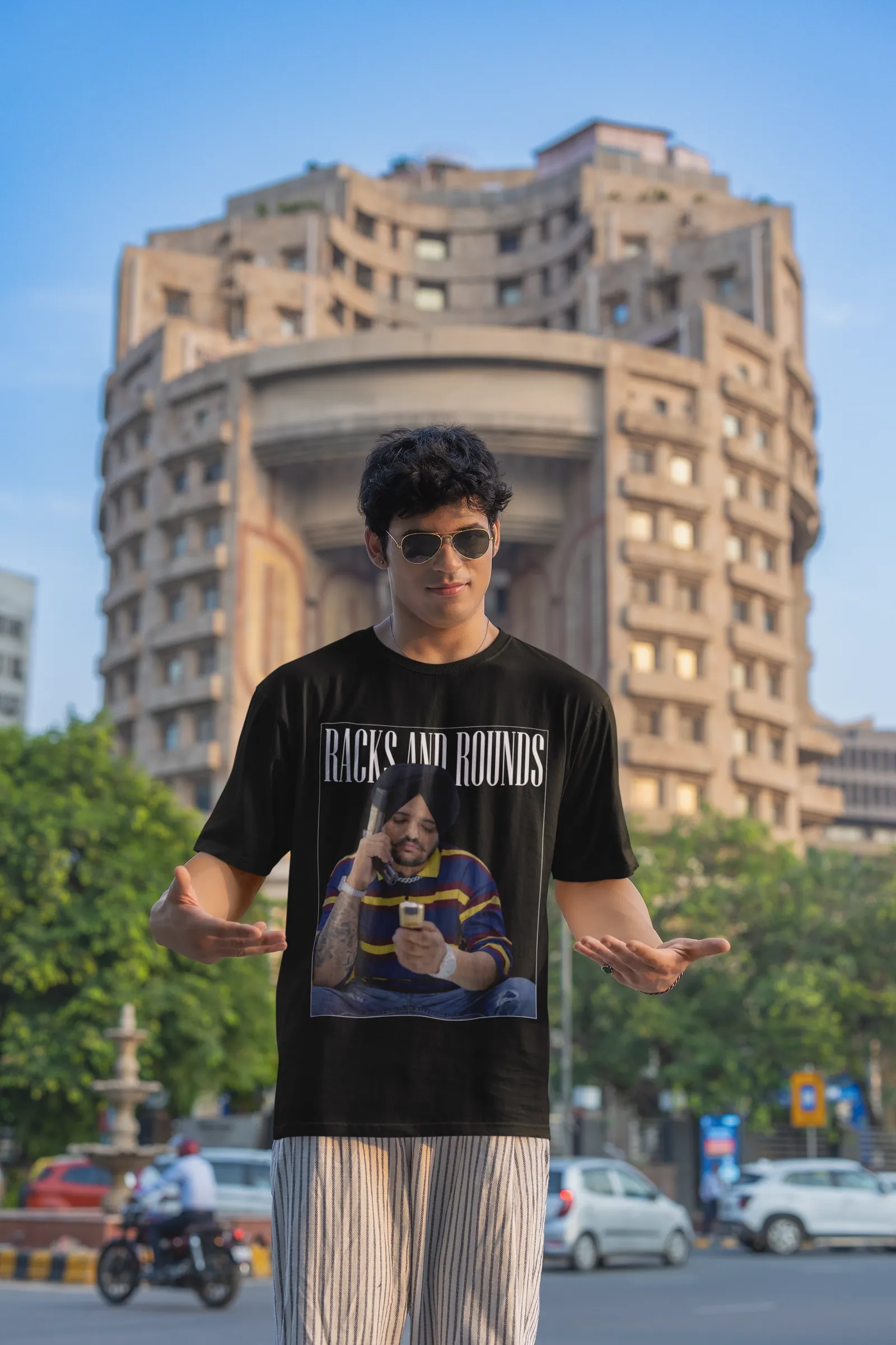 ["Premium Oversized 'Racks and Rounds' Tribute T-Shirt by YORD (T-Shirts) - photo 1 of 9", "Premium Oversized 'Racks and Rounds' Tribute T-Shirt by YORD (T-Shirts) - photo 2 of 9", "Premium Oversized 'Racks and Rounds' Tribute T-Shirt by YORD (T-Shirts) - photo 3 of 9", "Premium Oversized 'Racks and Rounds' Tribute T-Shirt by YORD (T-Shirts) - photo 4 of 9", "Premium Oversized 'Racks and Rounds' Tribute T-Shirt by YORD (T-Shirts) - photo 5 of 9", "Premium Oversized 'Racks and Rounds' Tribute T-Shirt by YORD