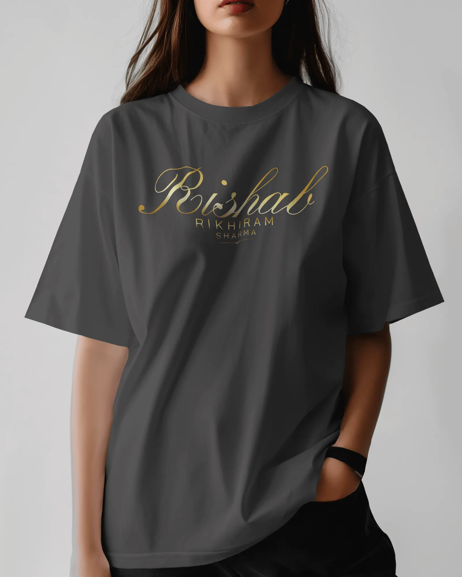 ["Premium Hand Printed Oversized 'Rishab Rikhiram Sharma' Gold Script T-shirt by YORD (T-Shirts) - photo 1 of 9", "Premium Hand Printed Oversized 'Rishab Rikhiram Sharma' Gold Script T-shirt by YORD (T-Shirts) - photo 2 of 9", "Premium Hand Printed Oversized 'Rishab Rikhiram Sharma' Gold Script T-shirt by YORD (T-Shirts) - photo 3 of 9", "Premium Hand Printed Oversized 'Rishab Rikhiram Sharma' Gold Script T-shirt by YORD (T-Shirts) - photo 4 of 9", "Premium Hand Printed Oversized 'Rishab Rikhiram Sharma' Go